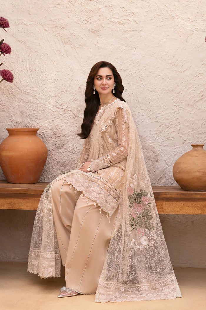 Model wearing beige embroidered shirt with lace detailing and matching floral dupatta from Saira Rizwan, Pakistani luxury pret, Pakistani clothes online in UK.