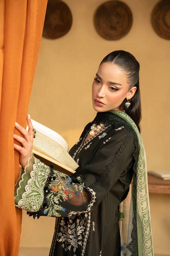 Model wearing black embroidered shirt with green and ivory detailing and matching dupatta from Saira Rizwan, Pakistani luxury pret, Pakistani clothes online in UK.