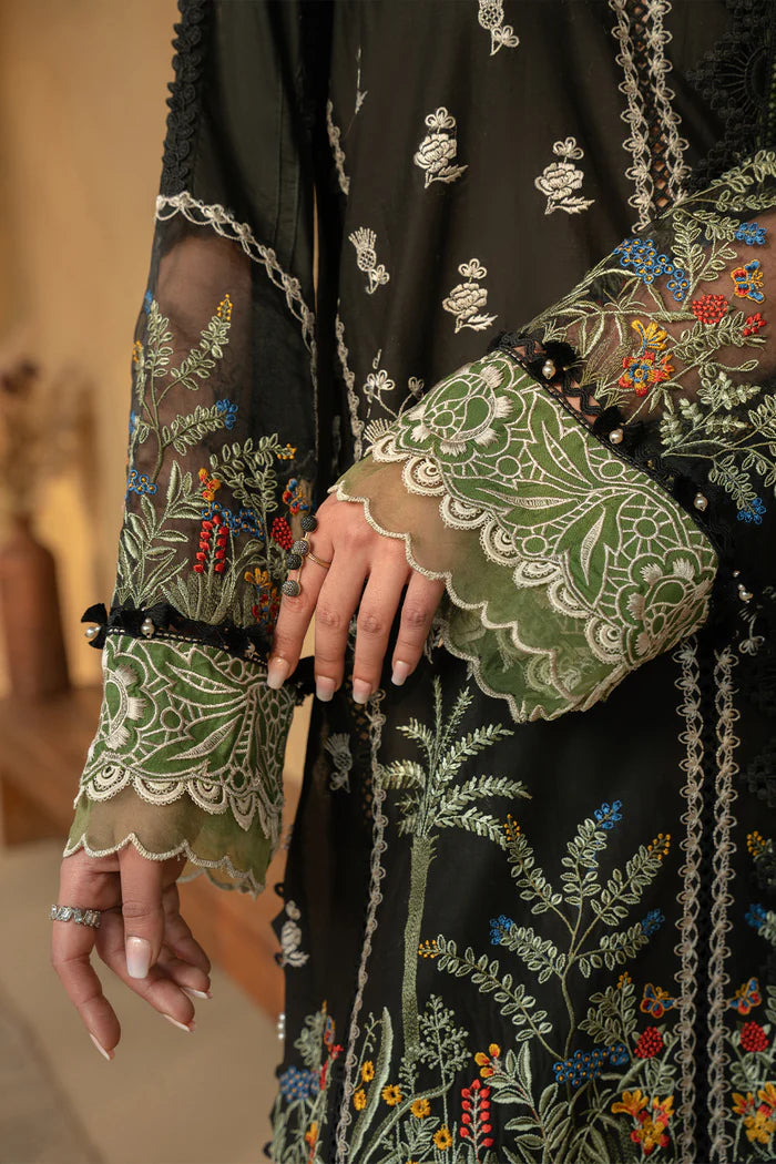 Model wearing black embroidered shirt with green and ivory detailing and matching dupatta from Saira Rizwan, Pakistani luxury pret, Pakistani clothes online in UK.