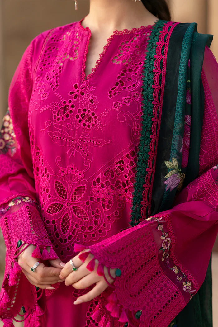 Model wearing hot pink embroidered three-piece suit with dark green printed dupatta from Saira Rizwan, Pakistani luxury pret, Pakistani clothes online in UK.
