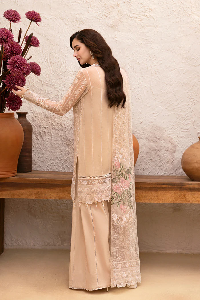 Model wearing beige embroidered shirt with lace detailing and matching floral dupatta from Saira Rizwan, Pakistani luxury pret, Pakistani clothes online in UK.