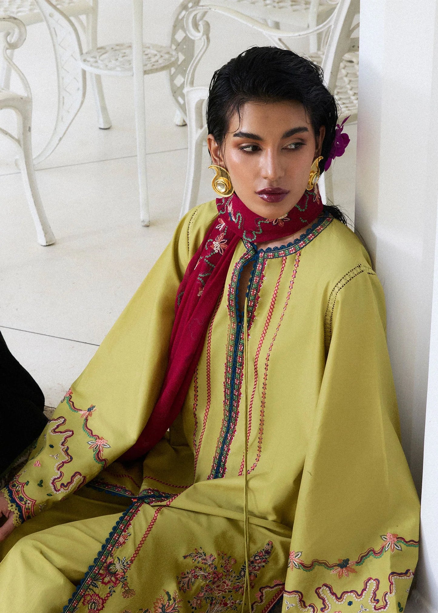 Model wearing apple green Alva outfit with red detailing from Hussain Rehar Pret SS '25, Pakistani luxury pret and clothes online in UK.