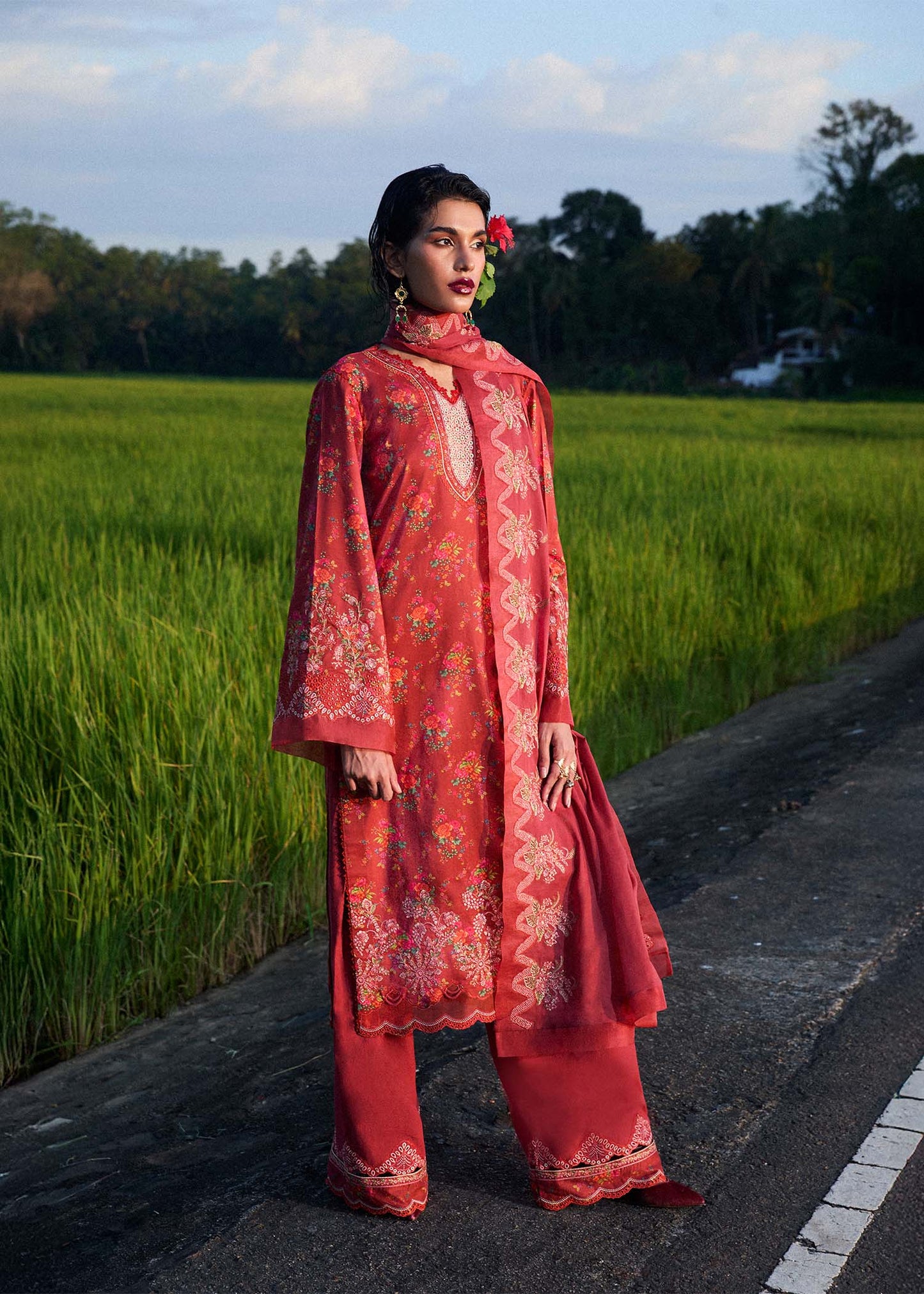 Model wearing deep coral red Nahla dress from Hussain Rehar Pret SS '25, highlighting Pakistani luxury pret and Pakistani clothes online in UK.