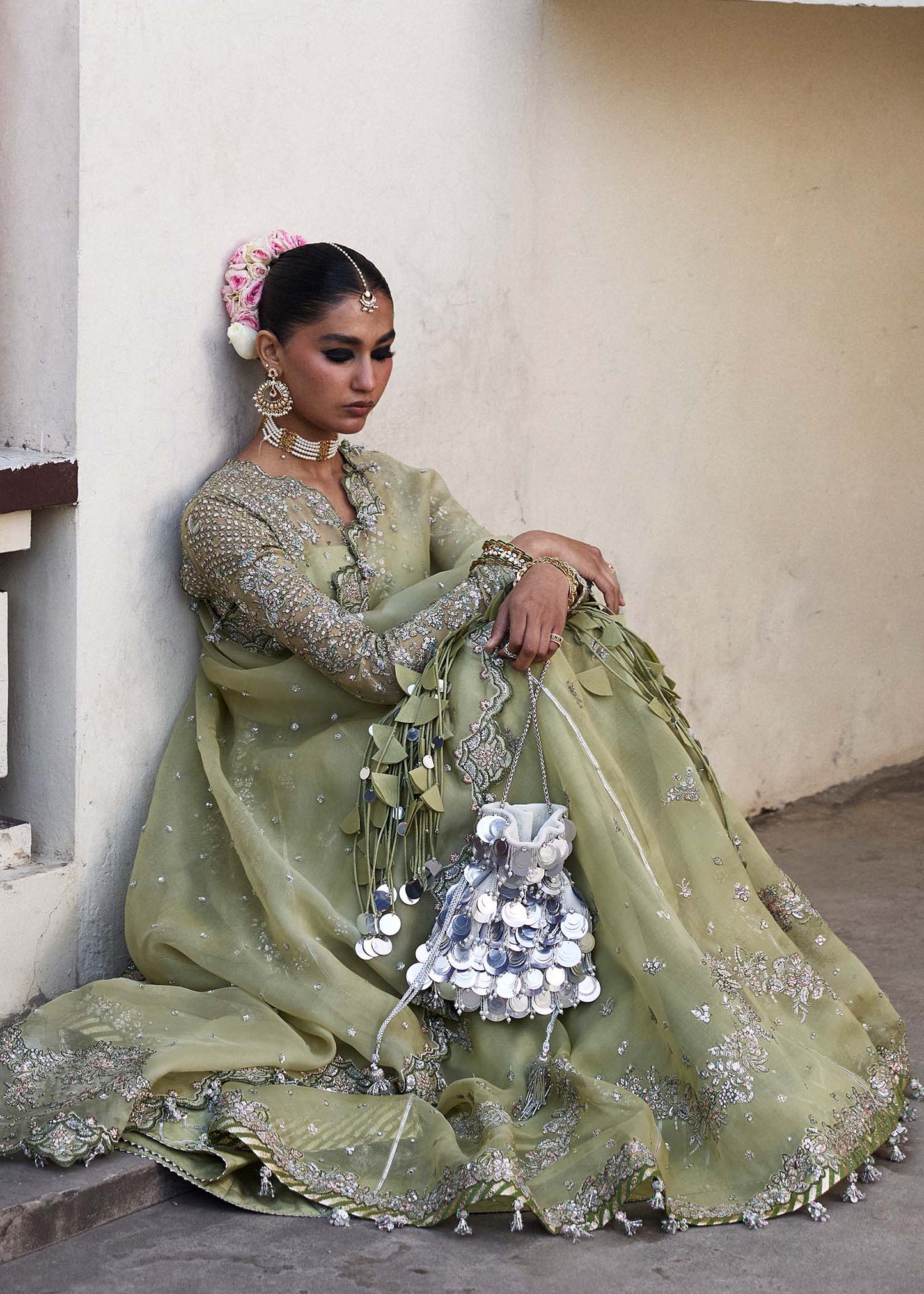 Model wearing Hussain Rehar Tahiri pastel green embroidered festive dress. Shop Pakistani clothes online in the UK for luxury occasion wear.