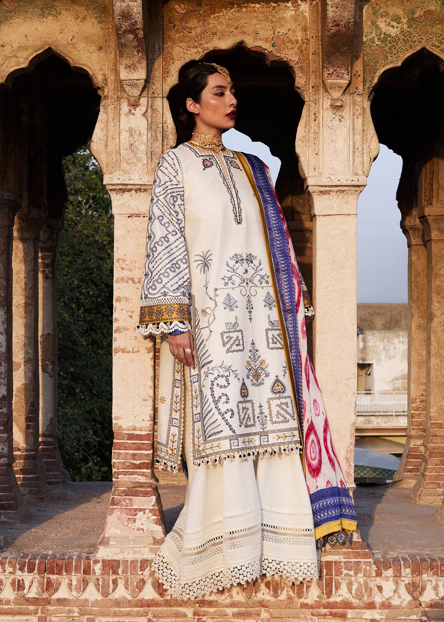 Model wearing ivory and multicolor Motia from Hussain Rehar Nirmal SS '25, Pakistani luxury pret and Pakistani clothes online in UK.