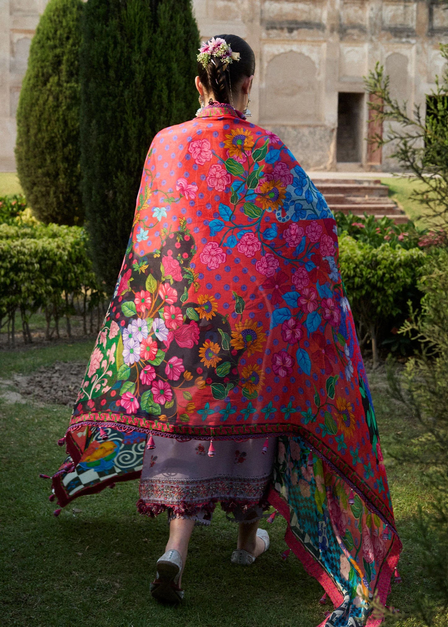Model wearing lilac and multicolor Inaya from Hussain Rehar Nirmal SS '25, Pakistani luxury pret and Pakistani clothes online in UK.