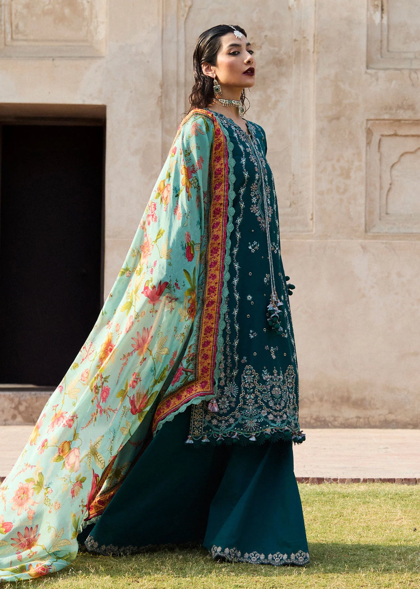 Model wearing teal and pastel floral Saher from Hussain Rehar Nirmal SS '25, Pakistani luxury pret and Pakistani clothes online in UK.