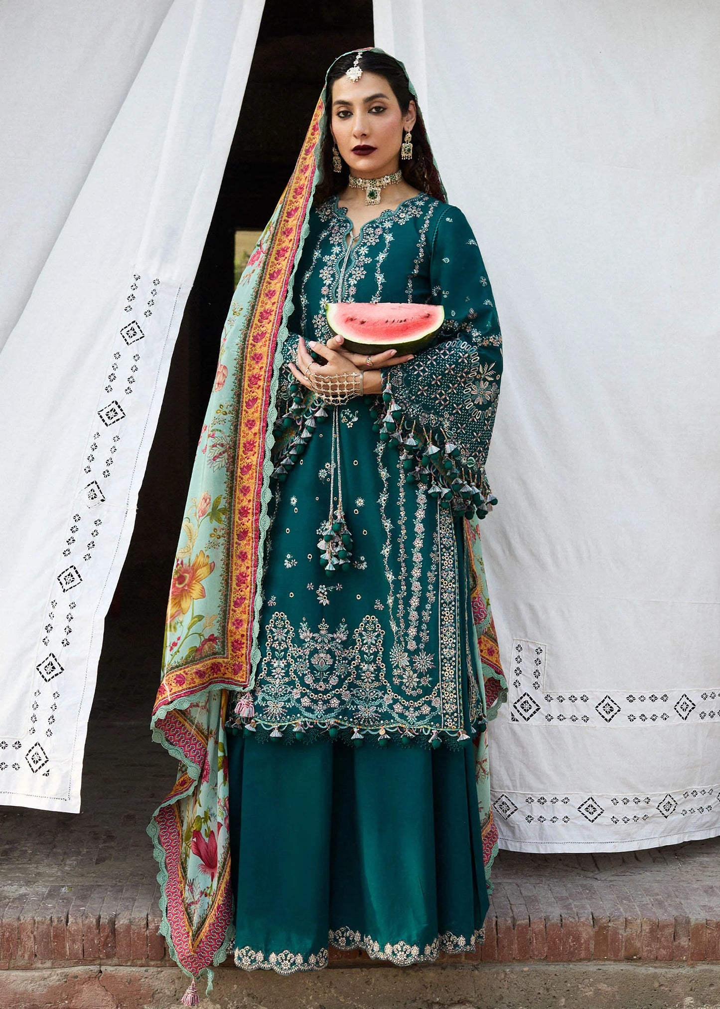 Model wearing teal and pastel floral Saher from Hussain Rehar Nirmal SS '25, Pakistani luxury pret and Pakistani clothes online in UK.
