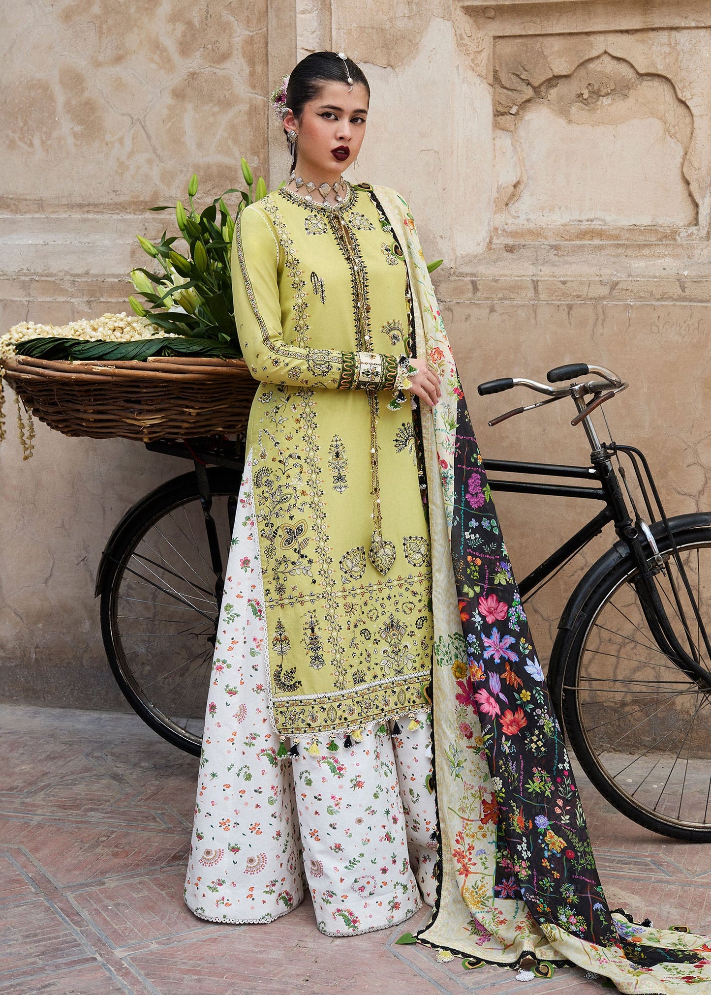 Model wearing lime green and multicolor Suk from Hussain Rehar Nirmal SS '25, Pakistani luxury pret and Pakistani clothes online in UK.