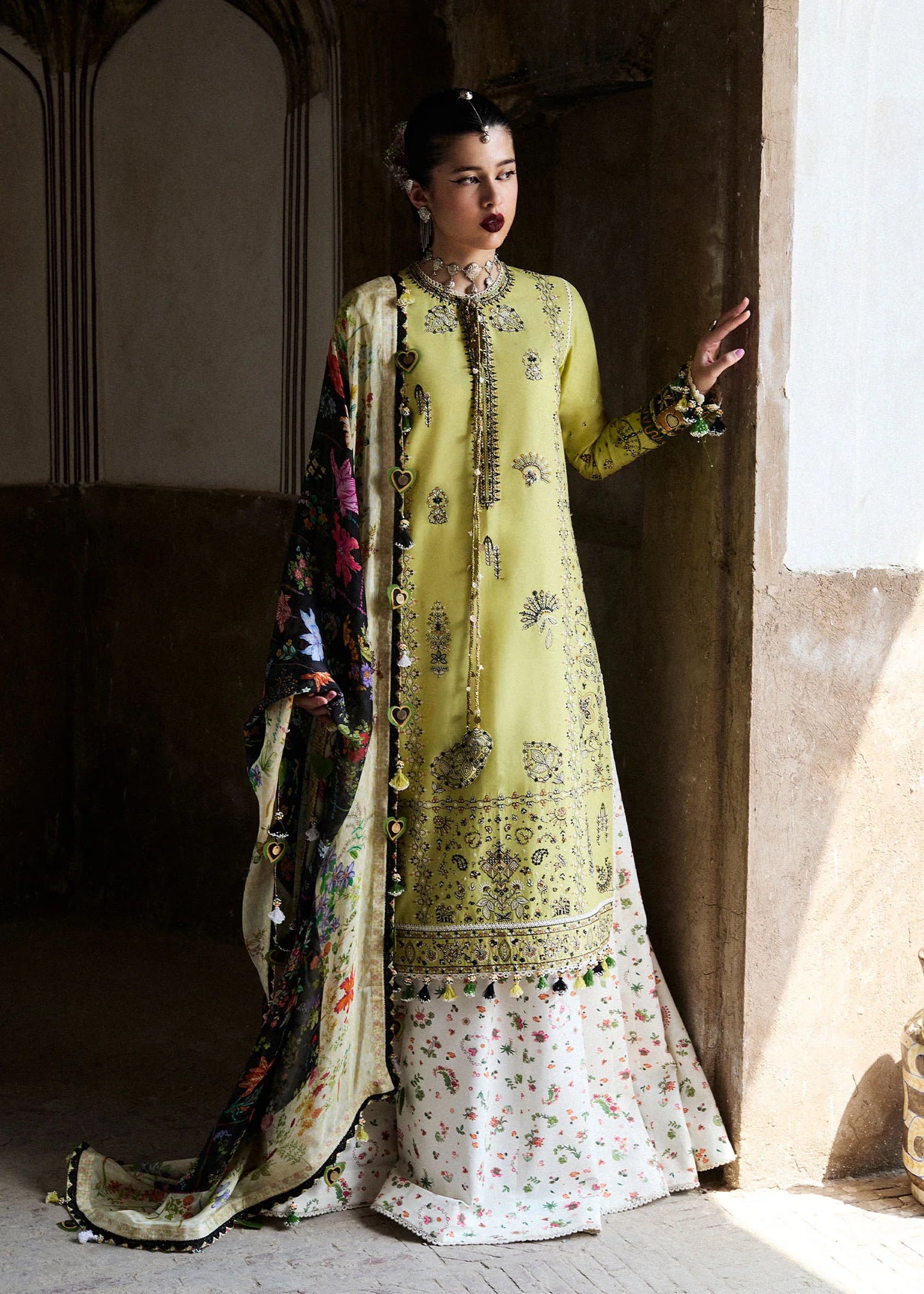 Model wearing lime green and multicolor Suk from Hussain Rehar Nirmal SS '25, Pakistani luxury pret and Pakistani clothes online in UK.