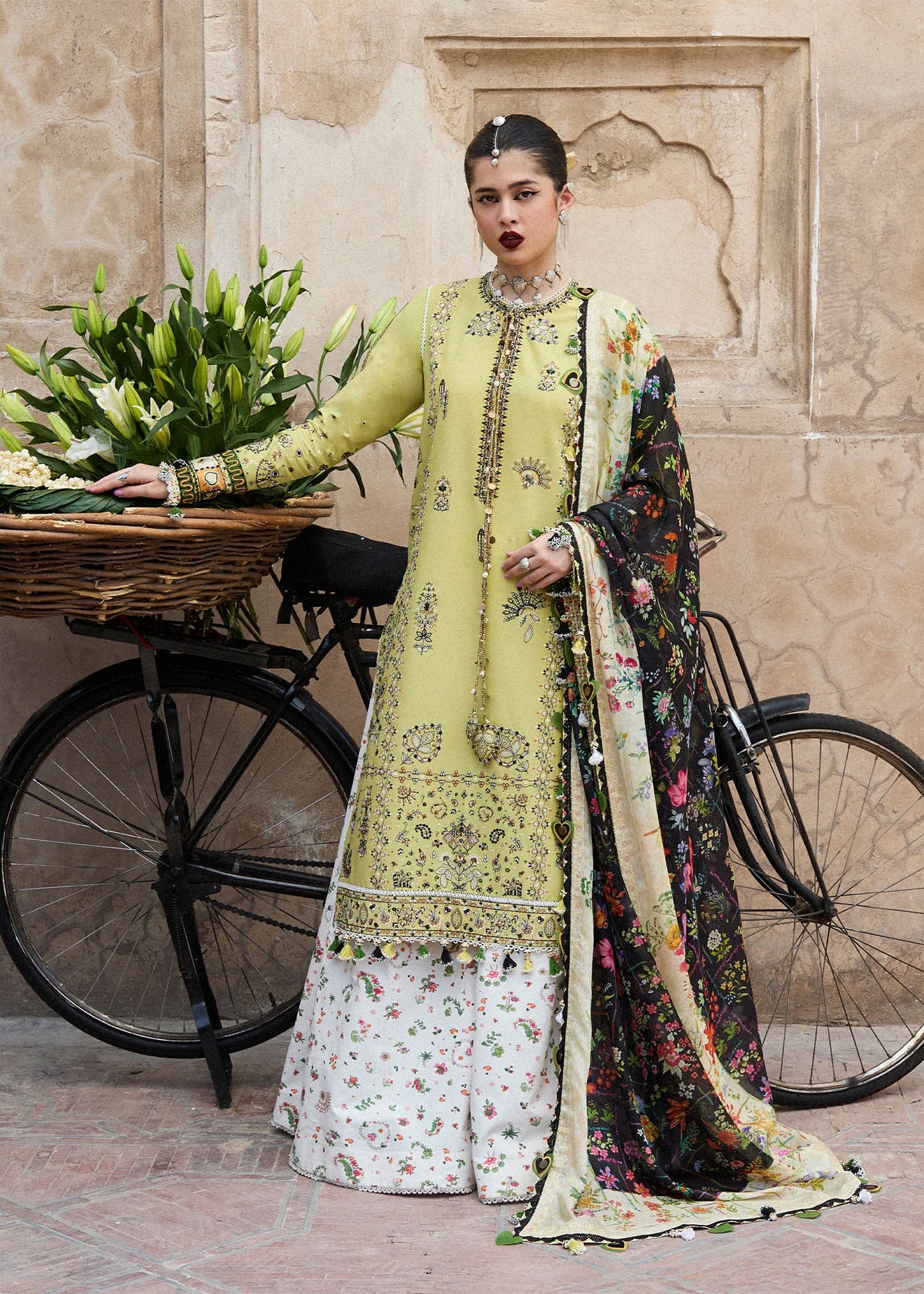 Model wearing lime green and multicolor Suk from Hussain Rehar Nirmal SS '25, Pakistani luxury pret and Pakistani clothes online in UK.