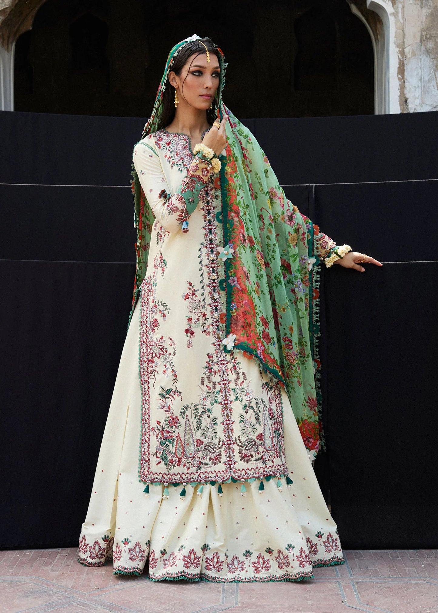 Model wearing cream and green Sahil from Hussain Rehar Nirmal SS '25, Pakistani luxury pret and Pakistani clothes online in UK.