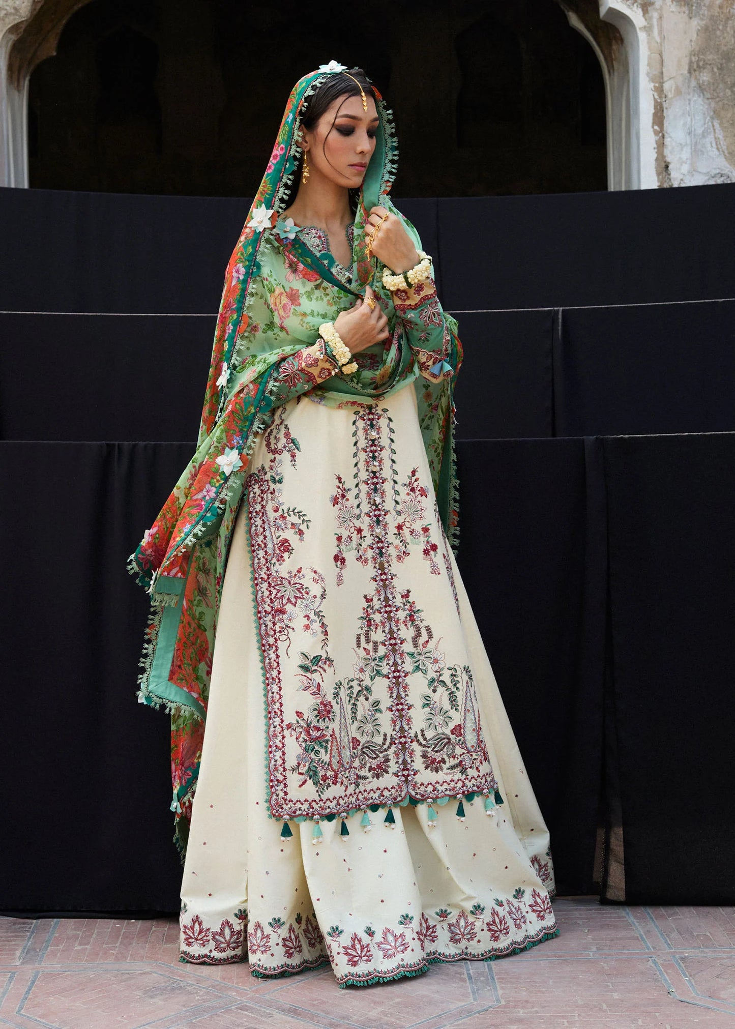 Model wearing cream and green Sahil from Hussain Rehar Nirmal SS '25, Pakistani luxury pret and Pakistani clothes online in UK.