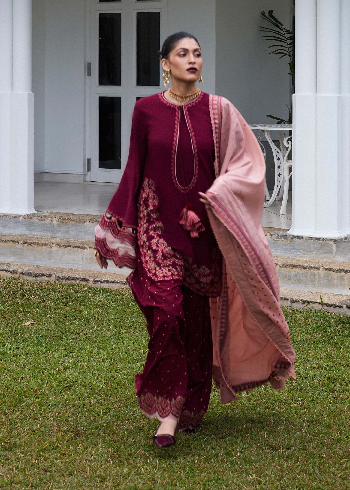Model wearing deep maroon Sarai outfit with blush pink dupatta from Hussain Rehar Pret SS '25, Pakistani luxury pret and clothes online in UK.