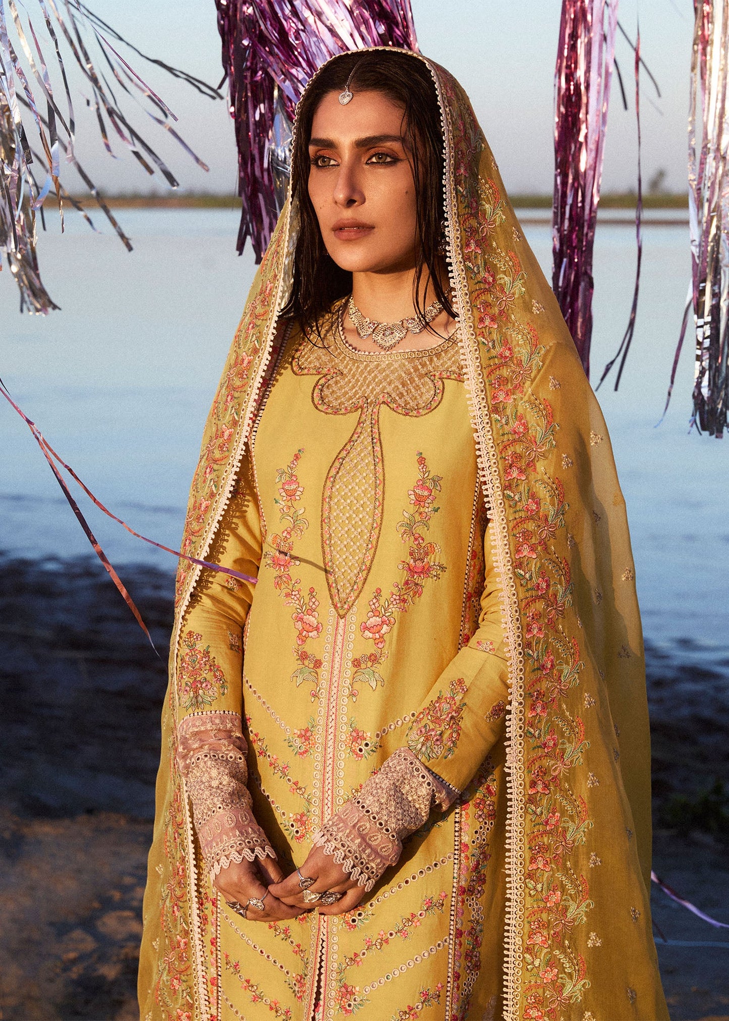 Model wearing mustard and ivory Soana dress from Hussain Rehar, showcasing Pakistani luxury pret and Pakistani clothes online in UK.