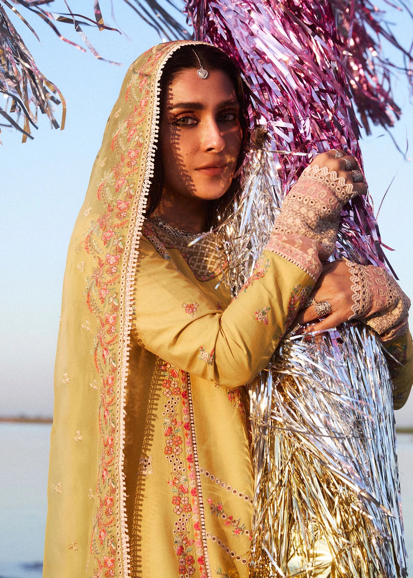 Model wearing mustard and ivory Soana dress from Hussain Rehar, showcasing Pakistani luxury pret and Pakistani clothes online in UK.