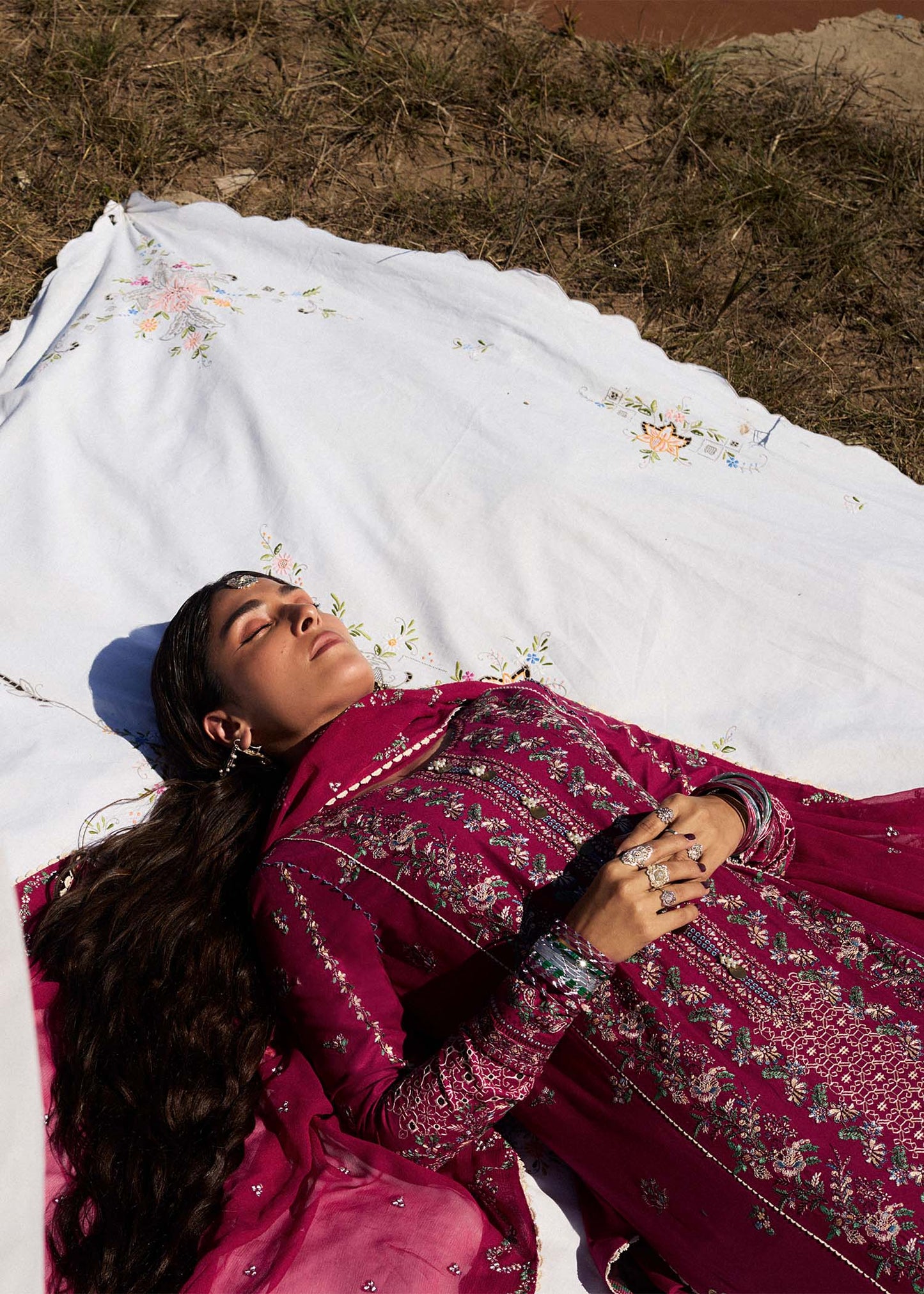 Model wearing deep pink embroidered dress Mehrunisa by Hussain Rehar, Pakistani luxury pret online in UK.