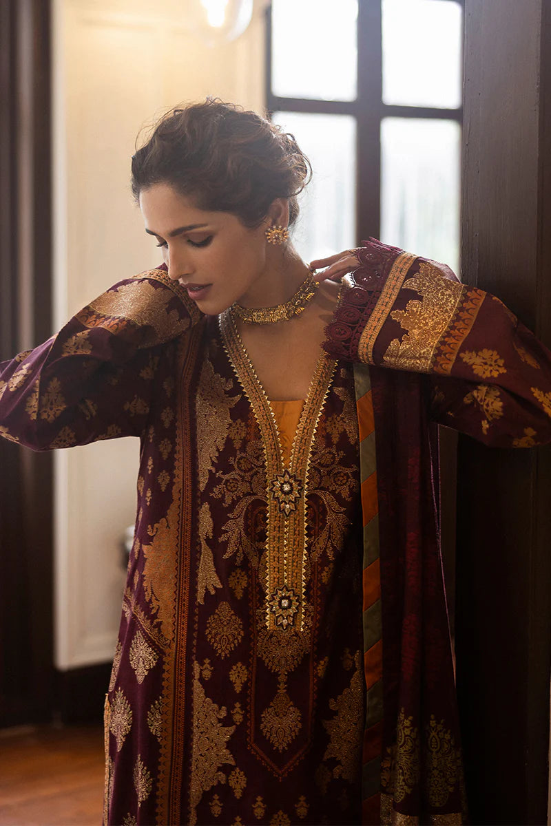 Model wearing deep maroon Morphea dress from Mushq Seraph Jacquard Lawn '25, Pakistani Luxury pret, Pakistani clothes online in UK.