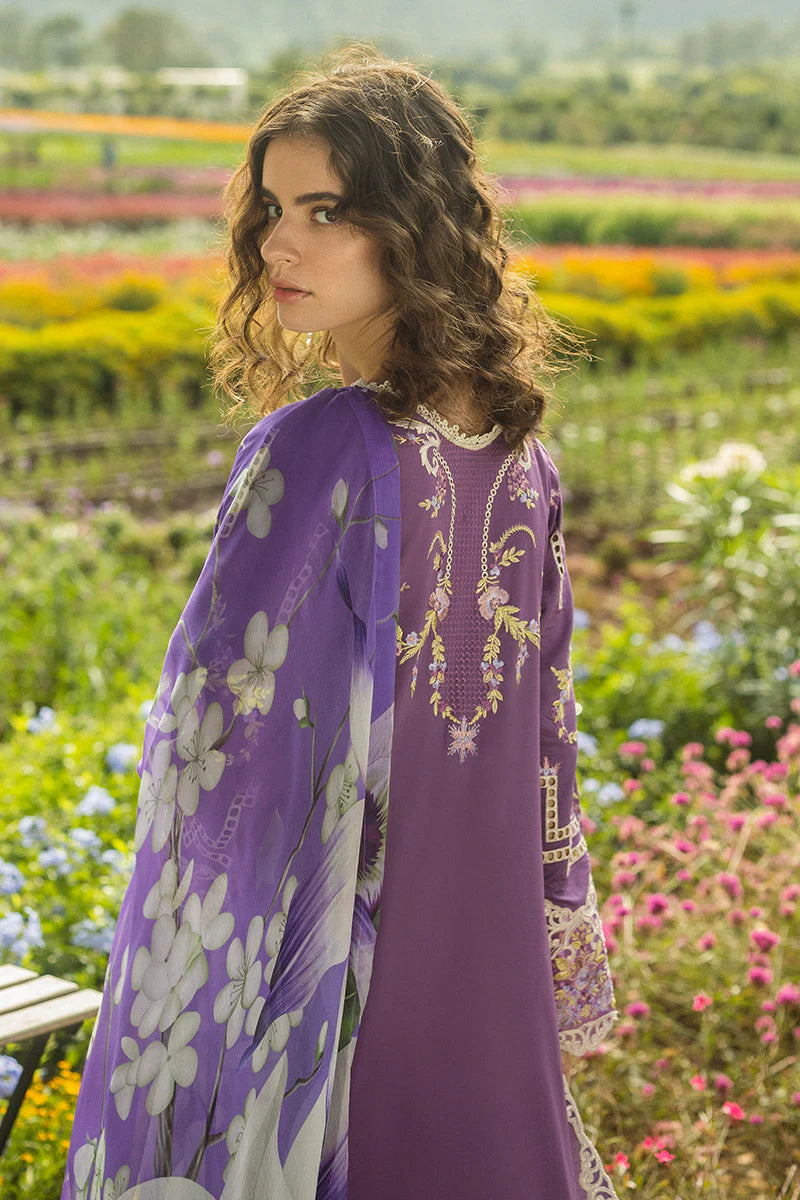 Model wearing deep purple Celestial Bloom dress from Mushq Secret Garden Spring/Summer '25, Pakistani Luxury pret, Pakistani clothes online in UK.