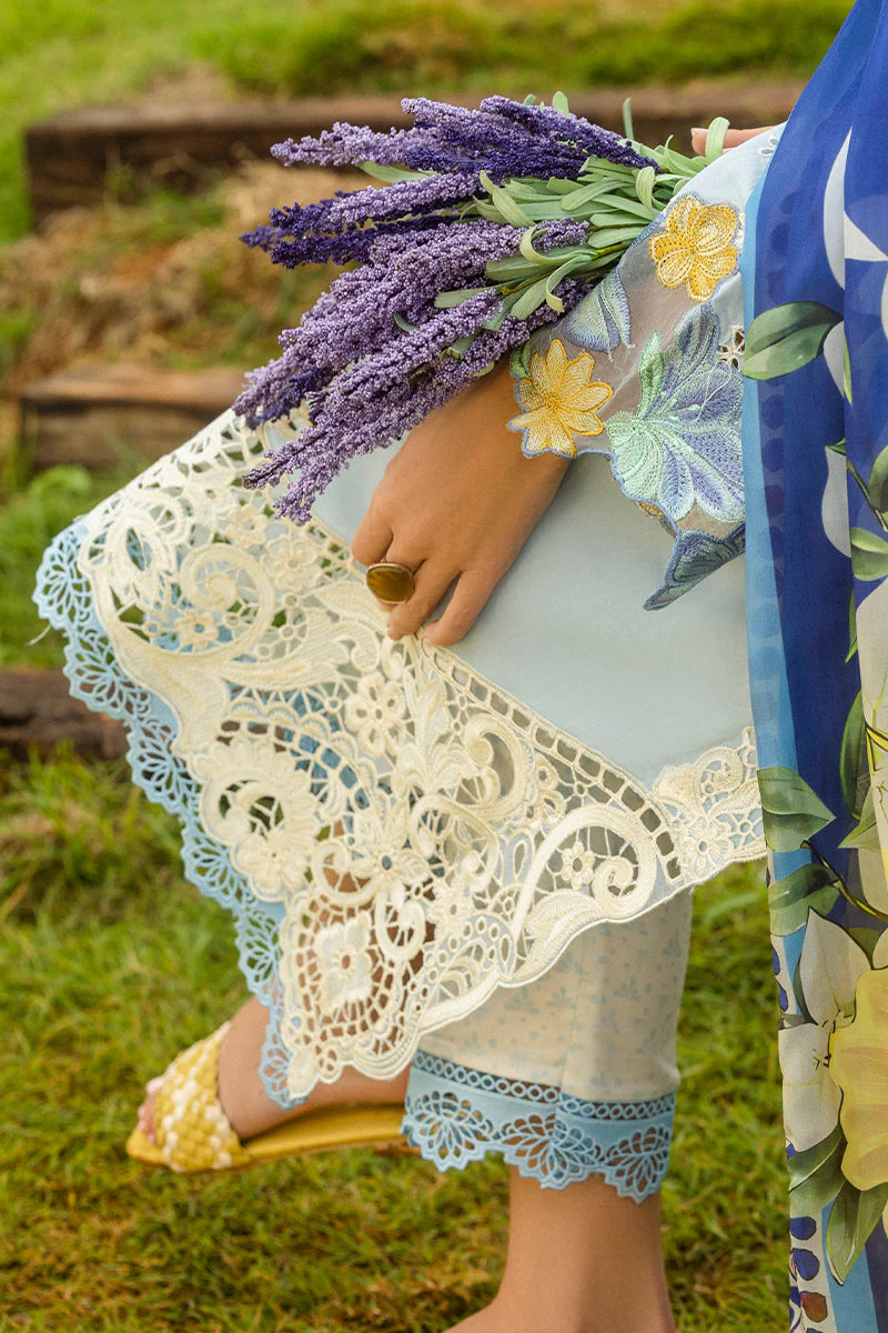 Model wearing pastel blue Hidden Oasis dress from Mushq Secret Garden Spring/Summer '25, Pakistani Luxury pret, Pakistani clothes online in UK.