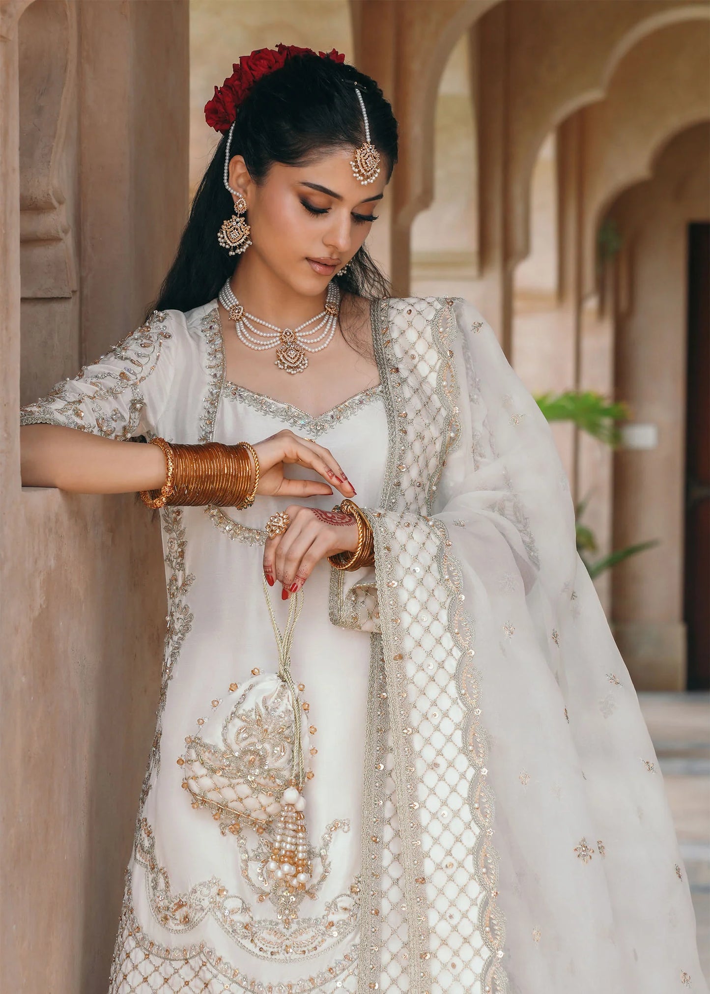 Model wearing Jaya by Kanwal Malik in ivory with gold embellishments – timeless Pakistani luxury pret outfit in UK.