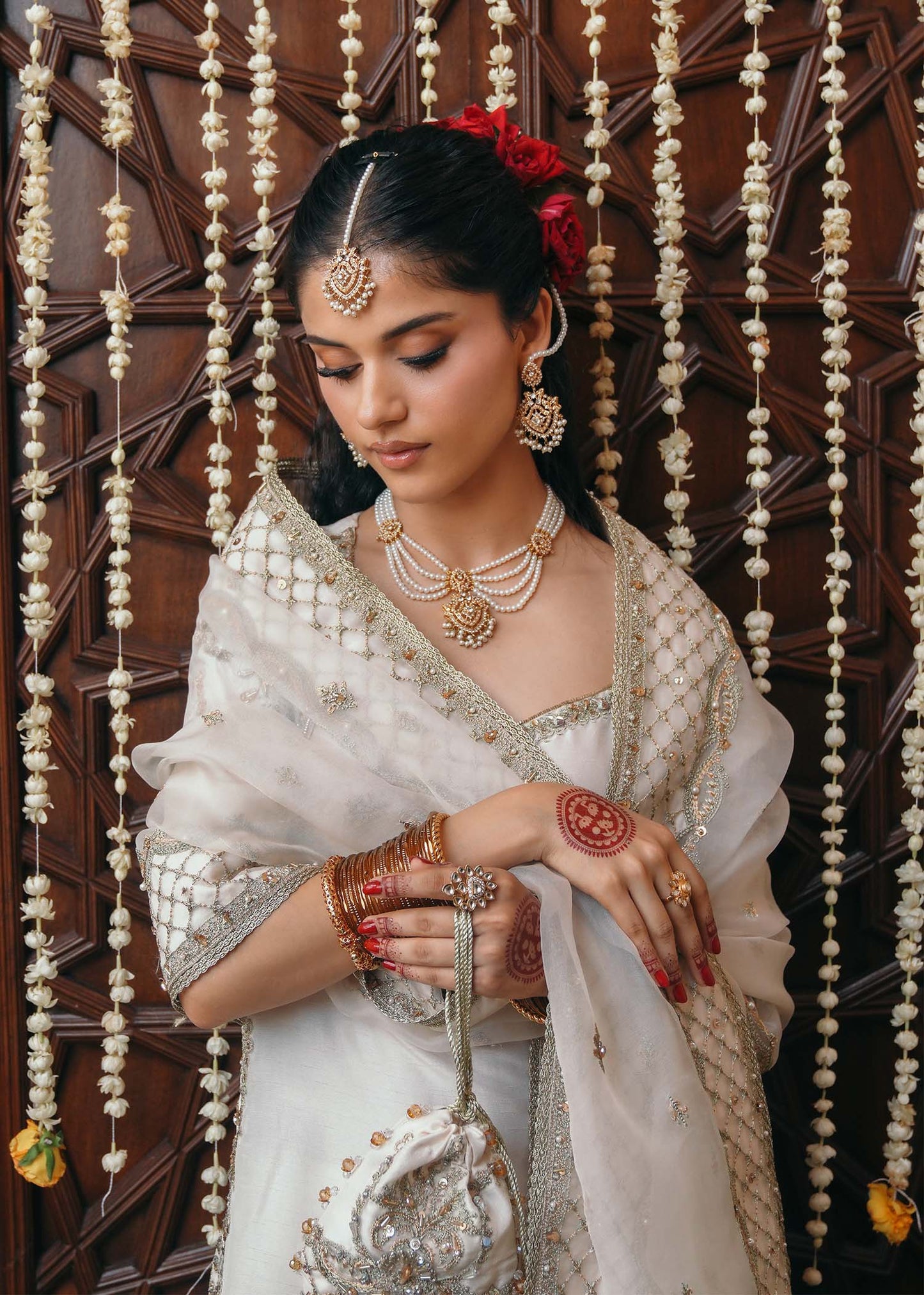 Model wearing Jaya by Kanwal Malik in ivory with gold embellishments – timeless Pakistani luxury pret outfit in UK.