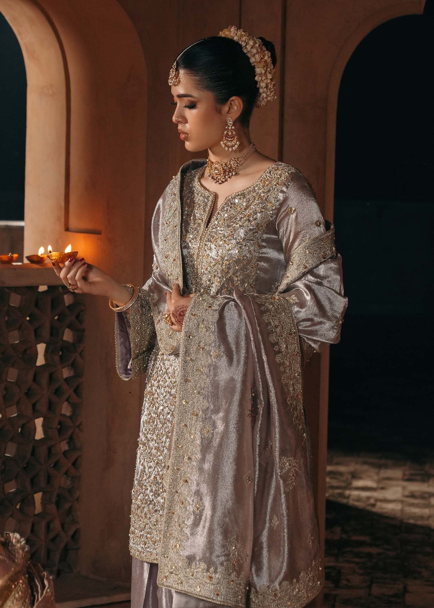 Model wearing Gulnaar by Kanwal Malik in metallic silver with intricate embellishments – elegant Pakistani luxury pret outfit in UK.