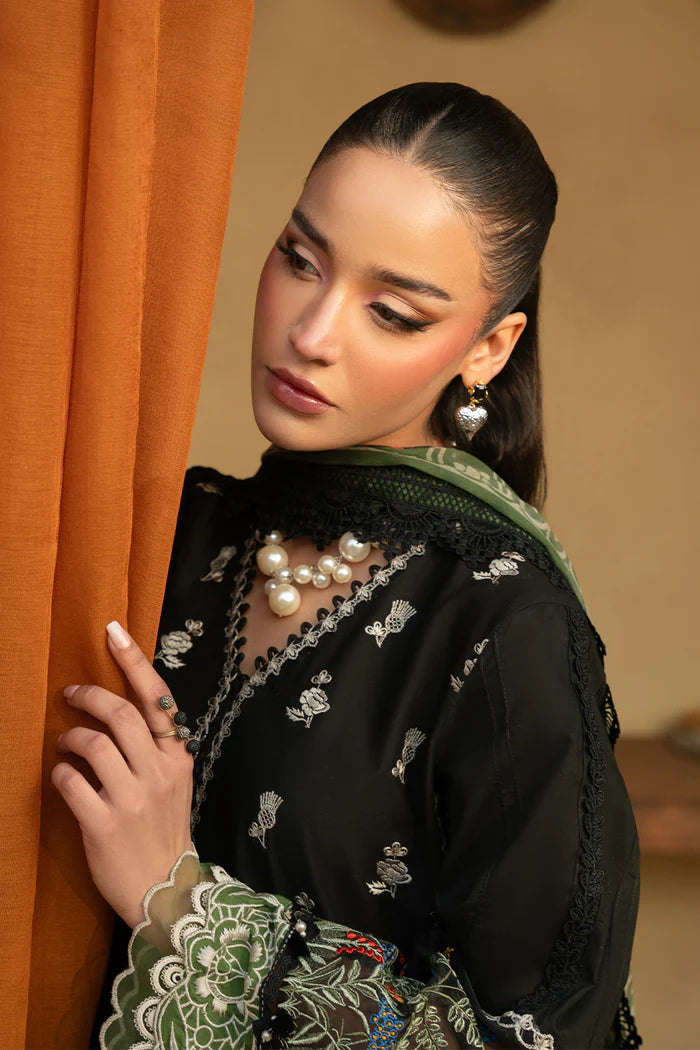 Model wearing black embroidered shirt with green and ivory detailing and matching dupatta from Saira Rizwan, Pakistani luxury pret, Pakistani clothes online in UK.
