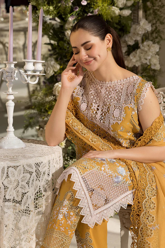 Model wearing Sobia Nazir Design 6B mustard yellow luxury lawn dress with intricate embroidery. Shop Pakistani clothes online in the UK for casual and festive wear.