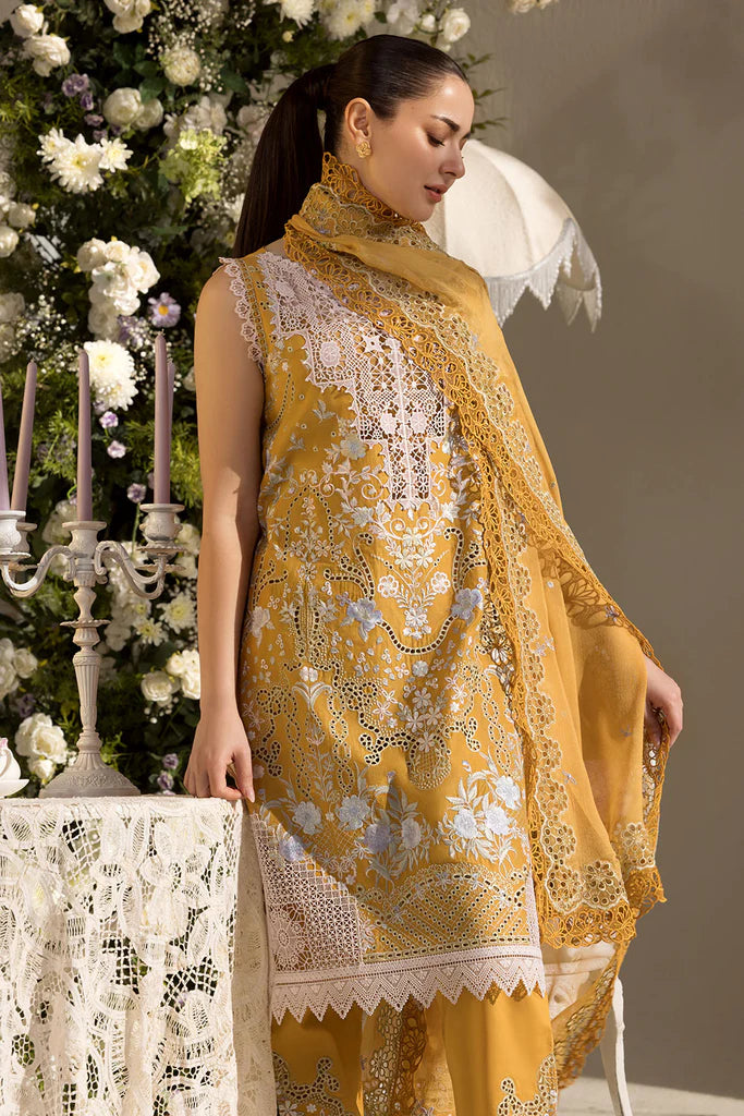 Model wearing Sobia Nazir Design 6B mustard yellow luxury lawn dress with intricate embroidery. Shop Pakistani clothes online in the UK for casual and festive wear.