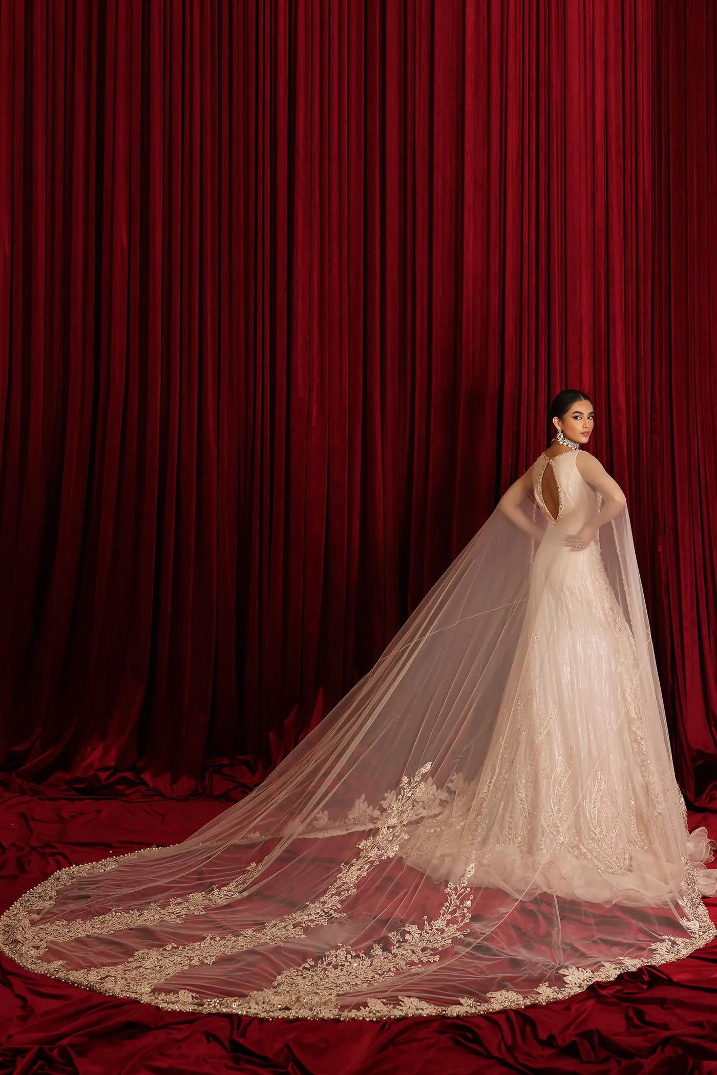 Model in Musferah Saad Starlit Queen, a Pakistani bridal gown in UK.