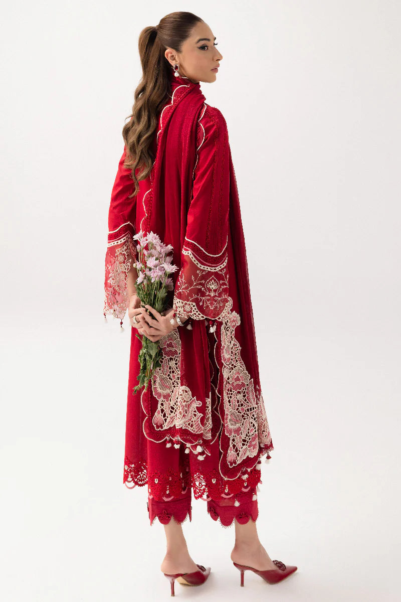 Please write an alt text for a Shopify product image. The alt text should be no more than 125 characters long, clearly describe the image, and incorporate relevant SEO keywords for the product. 
The product is Qalamkar | Basic Pret '25 | KT-03 Naire and the image features model wearing KT-03 Naire from Qalamkar. Aim to highlight keywords of brand name such as Saffron and Pakistani clothes online in UK, Pakistani Luxury pret etc. and ensure the alt text is both descriptive and engaging for SEO purposes.