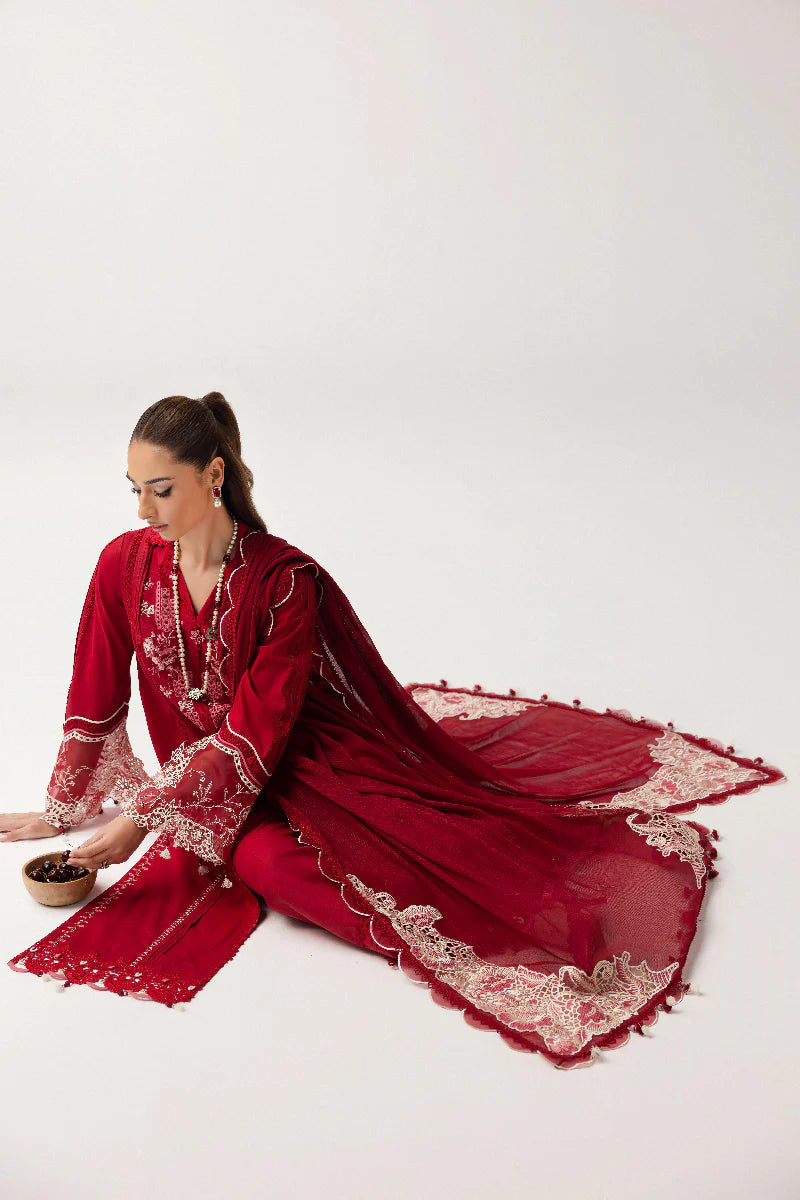 Please write an alt text for a Shopify product image. The alt text should be no more than 125 characters long, clearly describe the image, and incorporate relevant SEO keywords for the product. 
The product is Qalamkar | Basic Pret '25 | KT-03 Naire and the image features model wearing KT-03 Naire from Qalamkar. Aim to highlight keywords of brand name such as Saffron and Pakistani clothes online in UK, Pakistani Luxury pret etc. and ensure the alt text is both descriptive and engaging for SEO purposes.