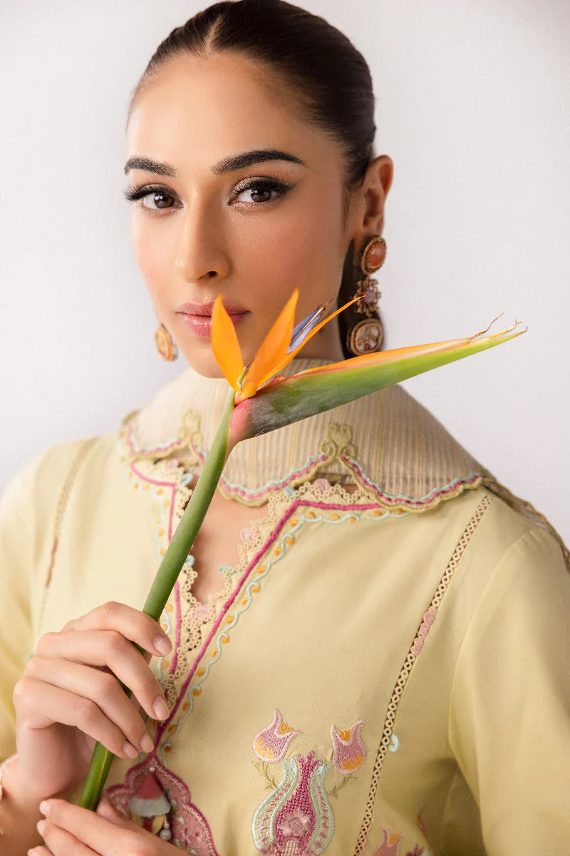 Model wearing lemon yellow embroidered dress from Qalamkar Basic Pret '25 KT-04 Afra, Saffron Pakistani Luxury pret online in UK.