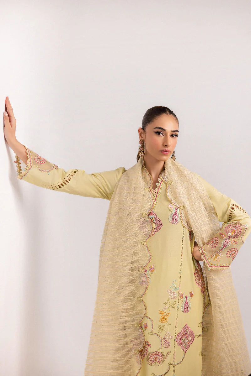 Model wearing lemon yellow embroidered dress from Qalamkar Basic Pret '25 KT-04 Afra, Saffron Pakistani Luxury pret online in UK.