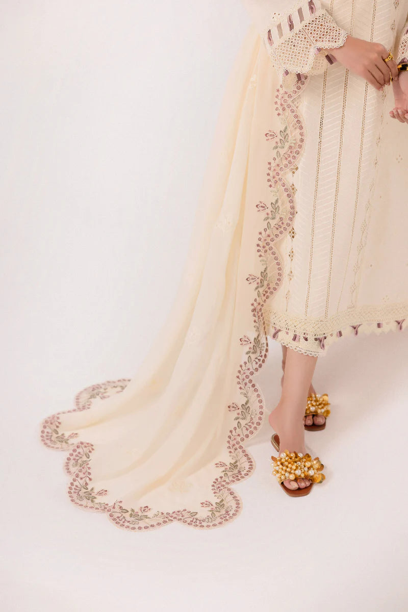 Model wearing ivory embroidered dress from Qalamkar Basic Pret '25 KT-01 Lverah, Saffron Pakistani Luxury pret available online in UK.