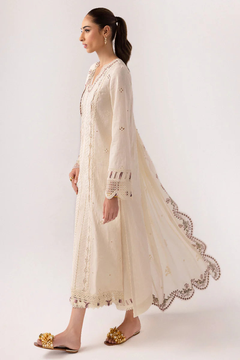 Model wearing ivory embroidered dress from Qalamkar Basic Pret '25 KT-01 Lverah, Saffron Pakistani Luxury pret available online in UK.