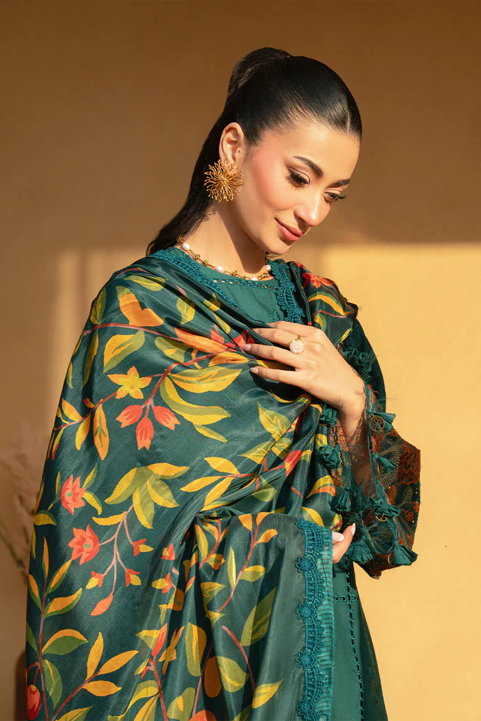 Model wearing emerald green embroidered dress with floral printed dupatta from Saira Rizwan, Pakistani luxury pret, Pakistani clothes online in UK.