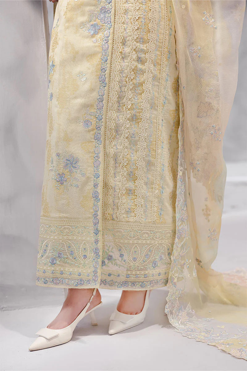 Model wearing pastel yellow Aymber from Mushq La Toscana Casual Pret '25, Pakistani luxury pret and Pakistani clothes online in UK.