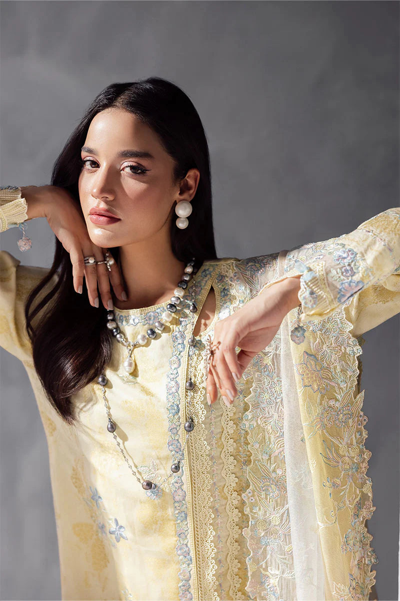 Model wearing pastel yellow Aymber from Mushq La Toscana Casual Pret '25, Pakistani luxury pret and Pakistani clothes online in UK.