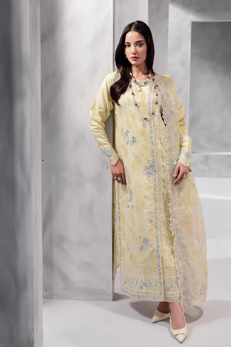 Model wearing pastel yellow Aymber from Mushq La Toscana Casual Pret '25, Pakistani luxury pret and Pakistani clothes online in UK.