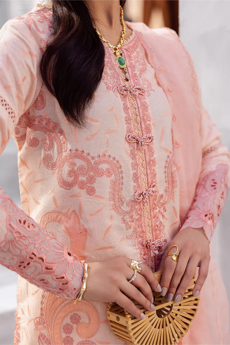 Model wearing peach pink Mitchelle from Mushq La Toscana Casual Pret '25, Pakistani luxury pret and Pakistani clothes online in UK.
