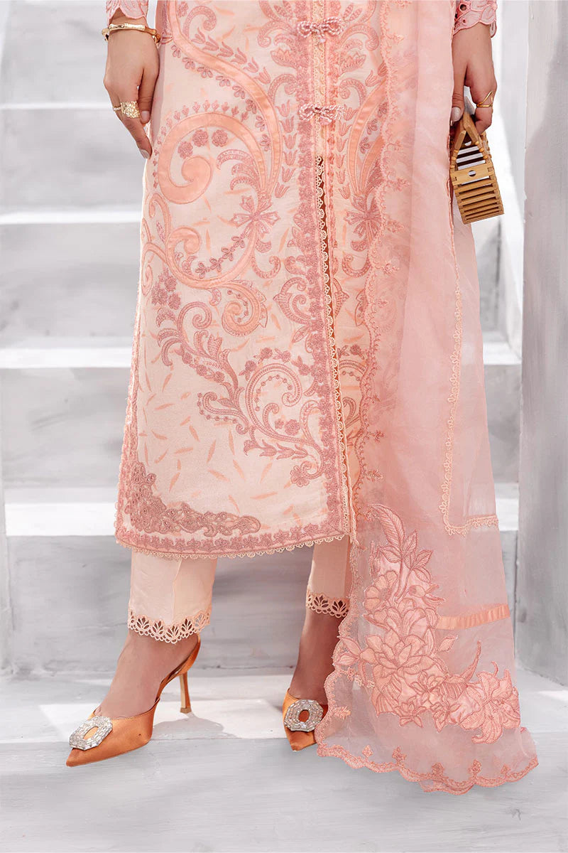 Model wearing peach pink Mitchelle from Mushq La Toscana Casual Pret '25, Pakistani luxury pret and Pakistani clothes online in UK.