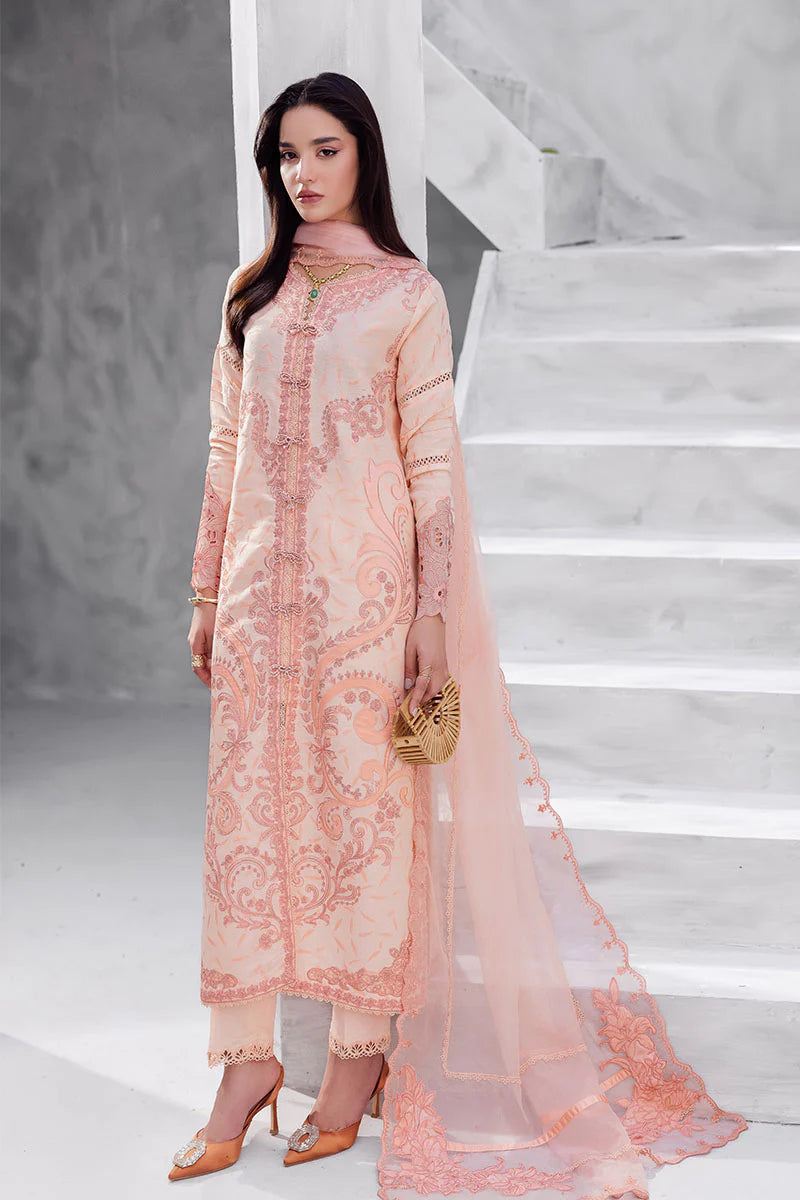 Model wearing peach pink Mitchelle from Mushq La Toscana Casual Pret '25, Pakistani luxury pret and Pakistani clothes online in UK.