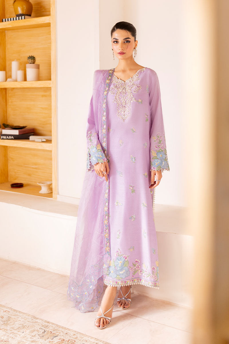 Model wearing pastel lilac embroidered outfit Serin from Mushq, featuring Pakistani luxury pret and Pakistani clothes online in UK.