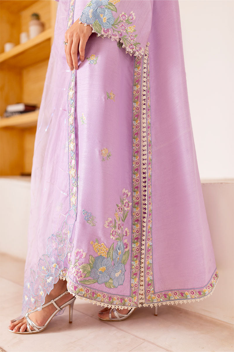 Model wearing pastel lilac embroidered outfit Serin from Mushq, featuring Pakistani luxury pret and Pakistani clothes online in UK.