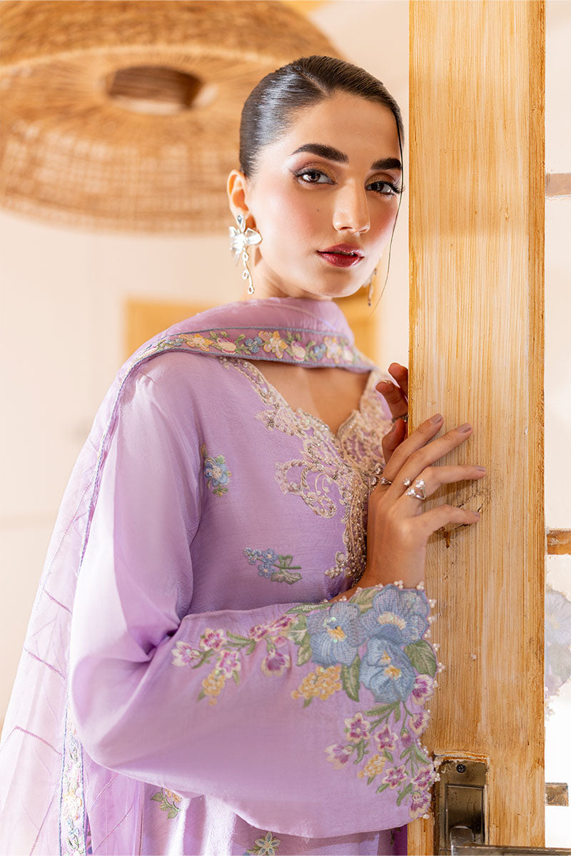 Model wearing pastel lilac embroidered outfit Serin from Mushq, featuring Pakistani luxury pret and Pakistani clothes online in UK.