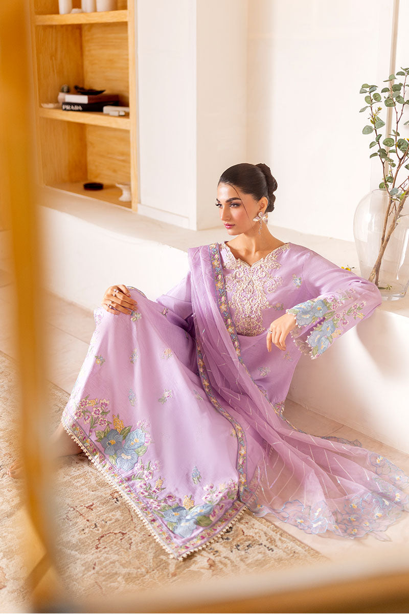 Model wearing pastel lilac embroidered outfit Serin from Mushq, featuring Pakistani luxury pret and Pakistani clothes online in UK.