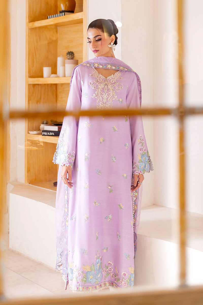 Model wearing pastel lilac embroidered outfit Serin from Mushq, featuring Pakistani luxury pret and Pakistani clothes online in UK.