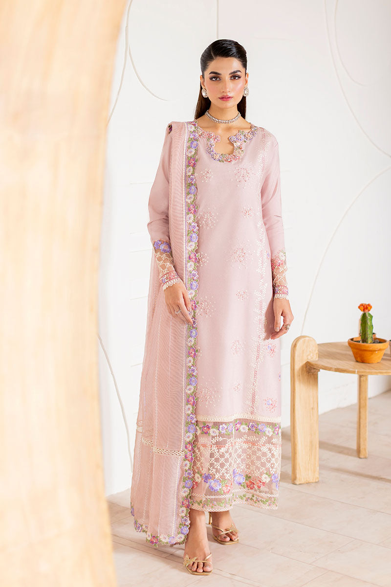 Model wearing blush pink embroidered Reyna outfit from Mushq, ideal for Pakistani luxury pret and Pakistani clothes online in UK.